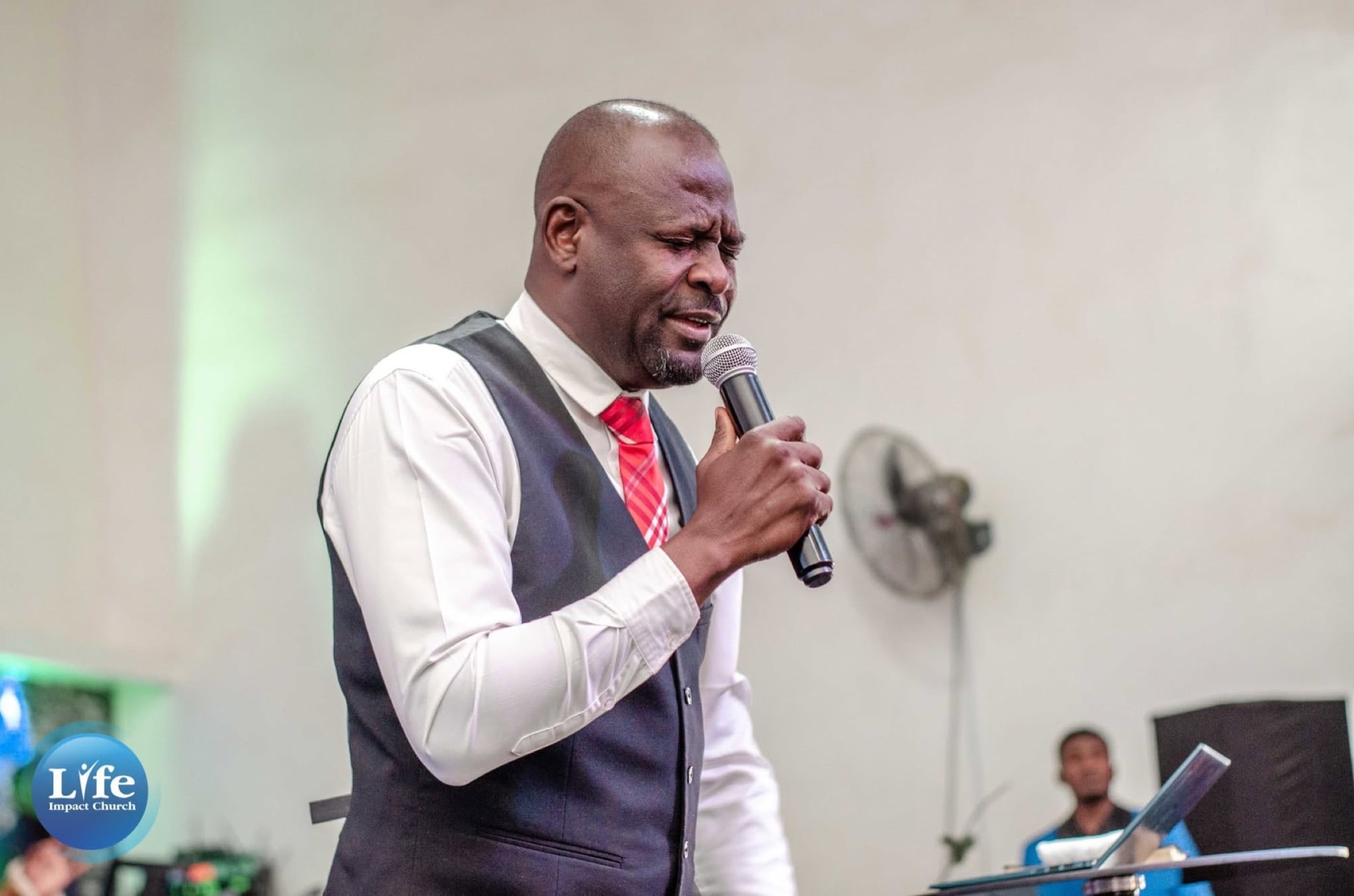 A minister preaching with passion